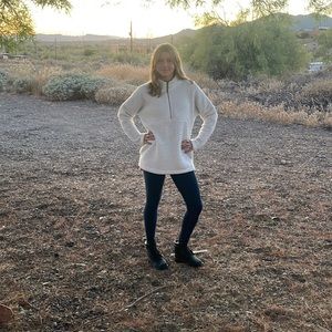 Kids white fluffy winter jacket.